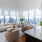 living and kitchen area with natural lighting and ample space for furniture arrangements