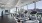 Fitness center with elliptical looking out into a city view