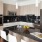 Kitchen space with gorgeous black granite countertops and lots of cabinet space